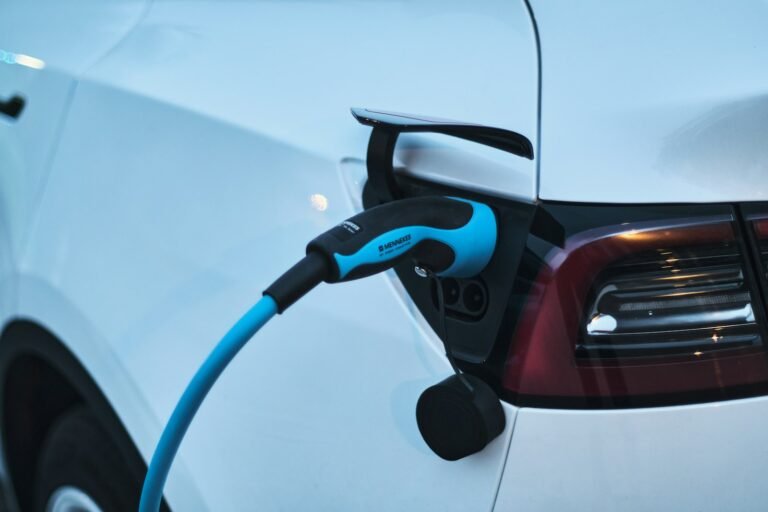 Electric car charging at a charging station