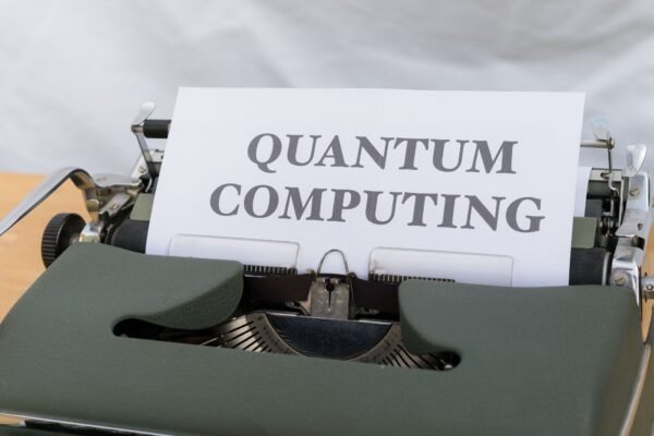 Vintage typewriter with paper reading Quantum Computing, symbolizing the shift toward next-generation computing